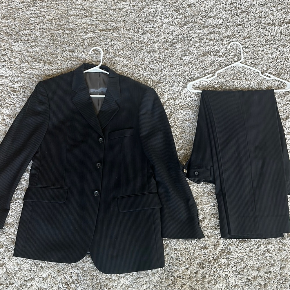 J ferrar black striped suit.